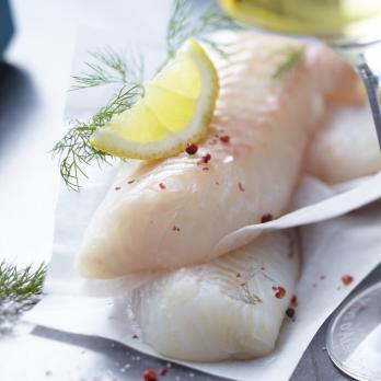 Cod en papillotes with herbs and julienne vegetables.