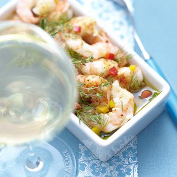 Marinated plancha-cooked king prawns